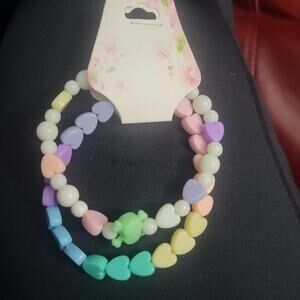 Skull bead and kandi pastel rainbow beaded bracelets